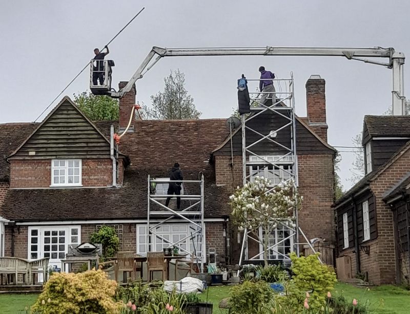 The Moss Cleaners using cherry picker and scaffolding to clean roof safely and professionally in 18 Lancaster Rd, Uxbridge UB8 1AP, UK, 18 Lancaster Rd, Uxbridge UB8 1AP, UK